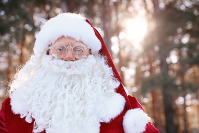 Photo of Happy Authentic Santa Claus outdoors, space for text