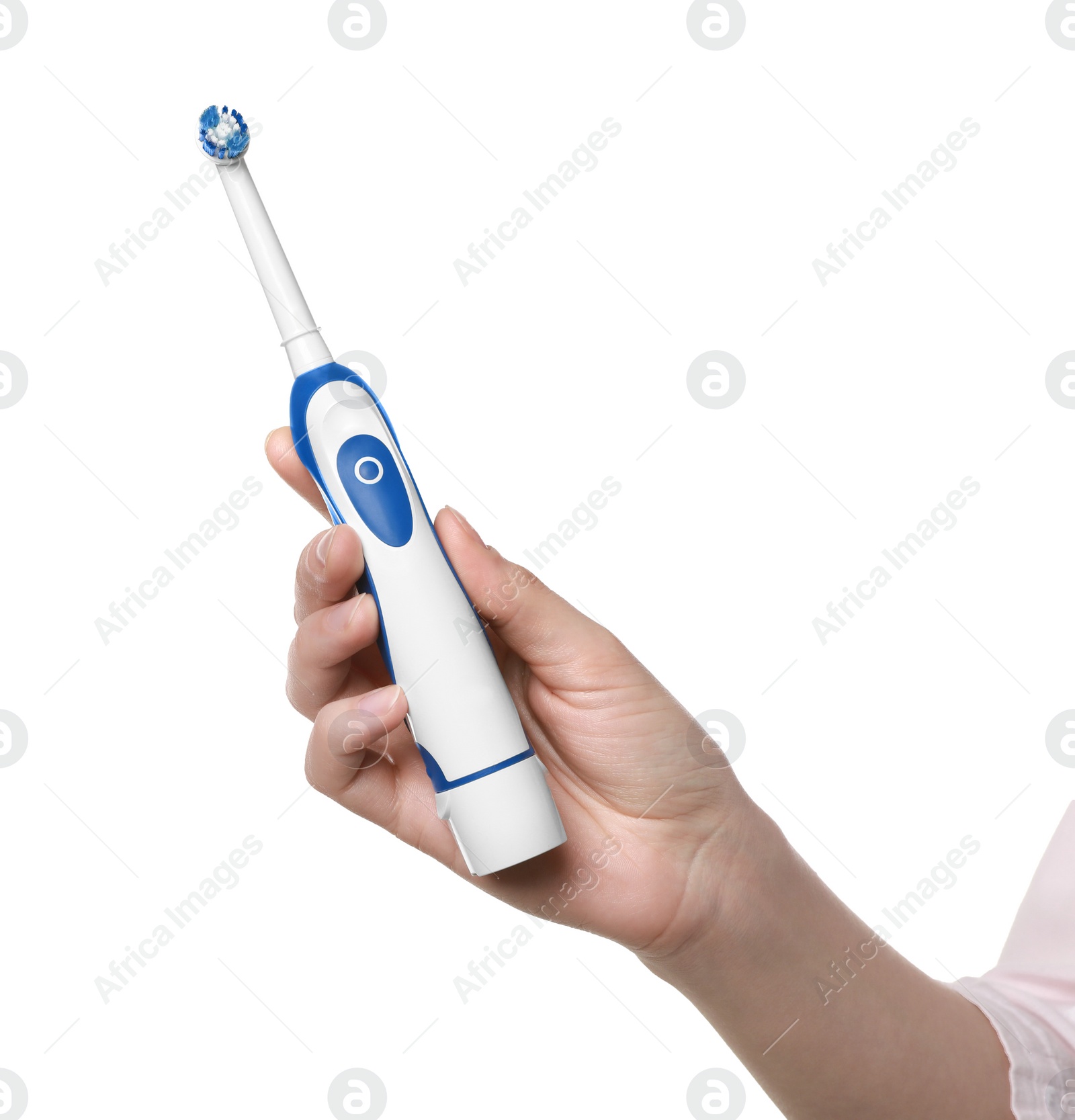 Photo of Woman holding electric toothbrush on white background, closeup