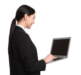 Young businesswoman with laptop on white background