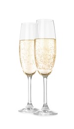 Photo of Glasses of sparkling wine on white background