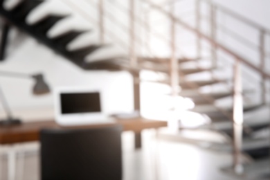 Photo of Modern brightly lit office with bokeh effect