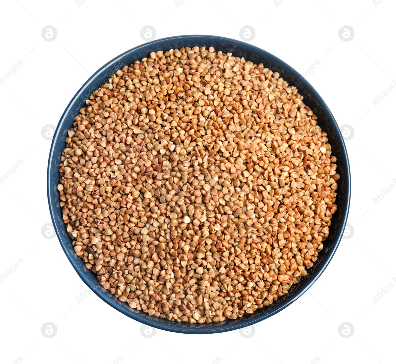 Photo of Bowl with uncooked buckwheat on white background, top view