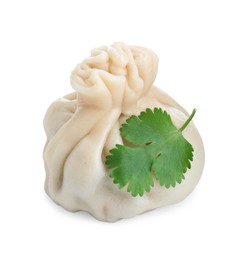 Photo of One tasty fresh khinkali (dumpling) and parsley isolated on white. Georgian cuisine