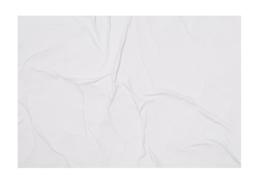 Photo of Top view of creased blank poster on white background