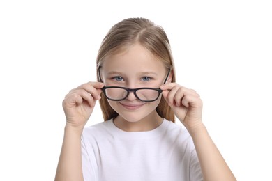 Portrait of cute girl in glasses on white background