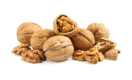 Photo of Pile of ripe walnuts on white background