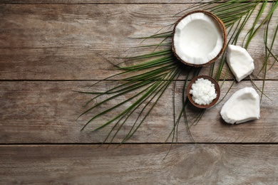 Photo of Composition with coconut oil on wooden background, top view. Healthy cooking