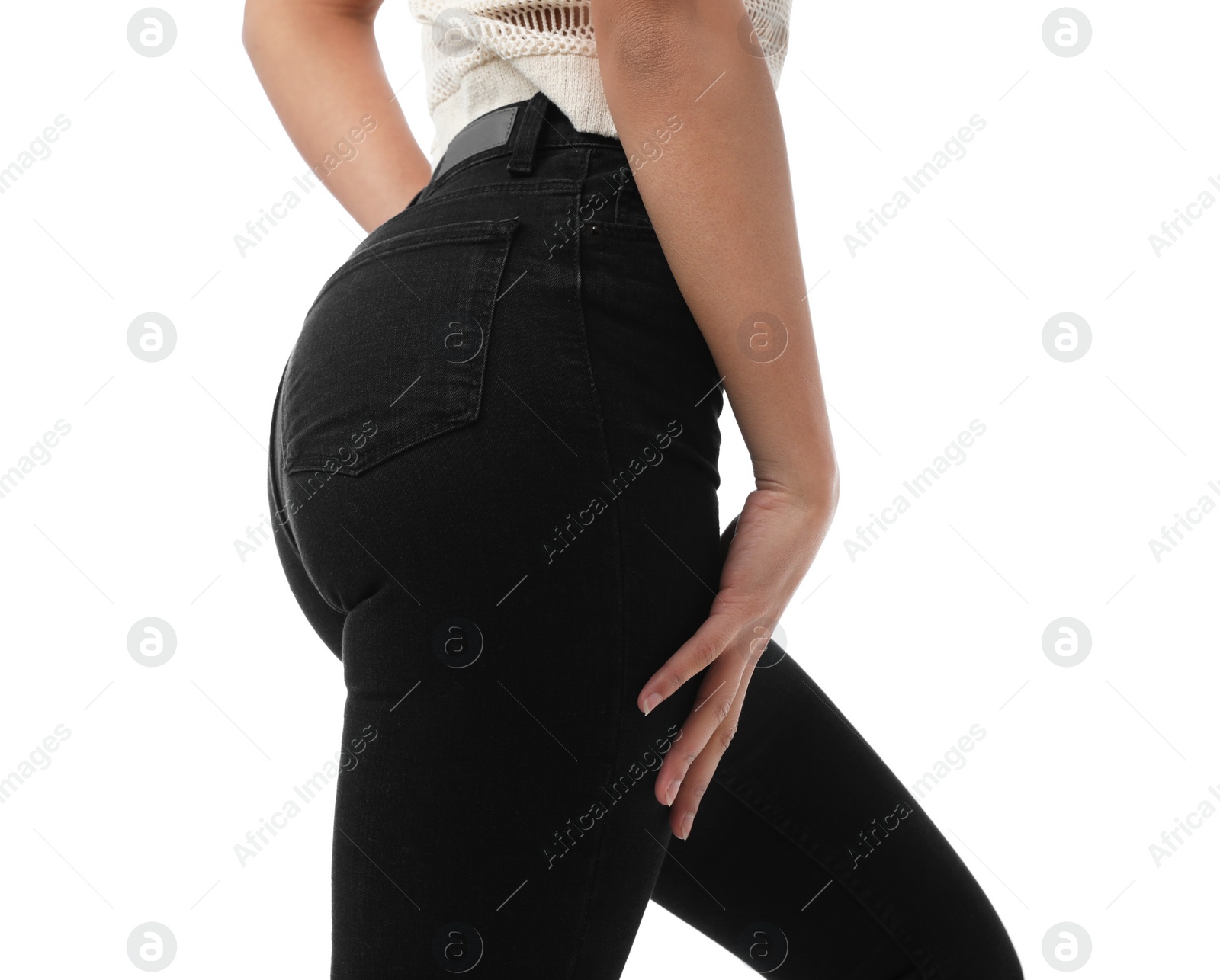 Photo of Woman wearing jeans on white background, closeup