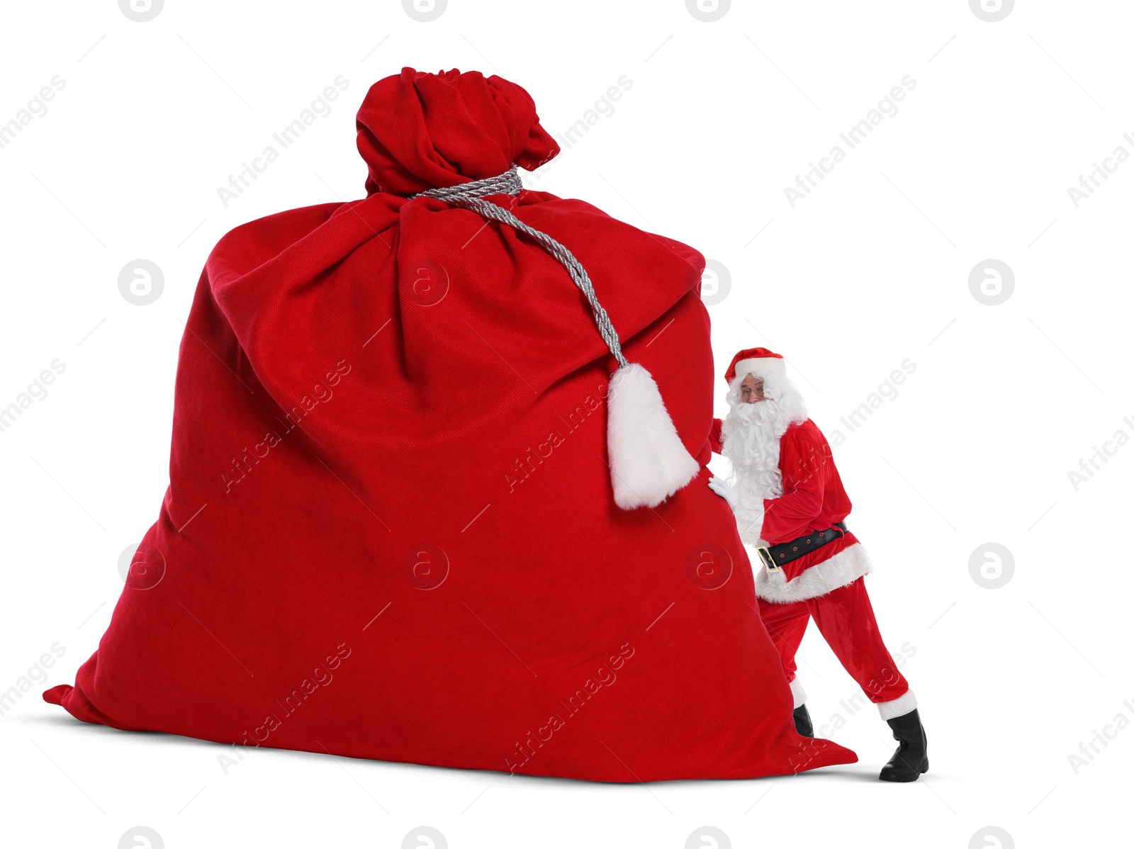 Image of Santa Claus with big red bag full of Christmas presents on white background