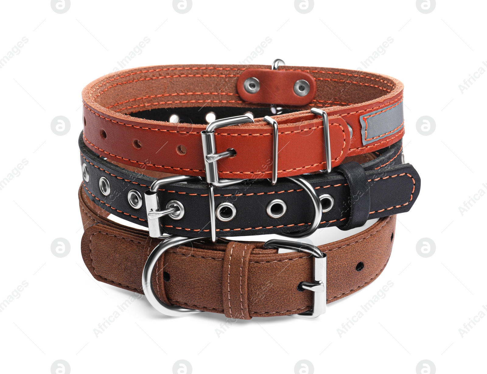 Photo of Different leather dog collars on white background