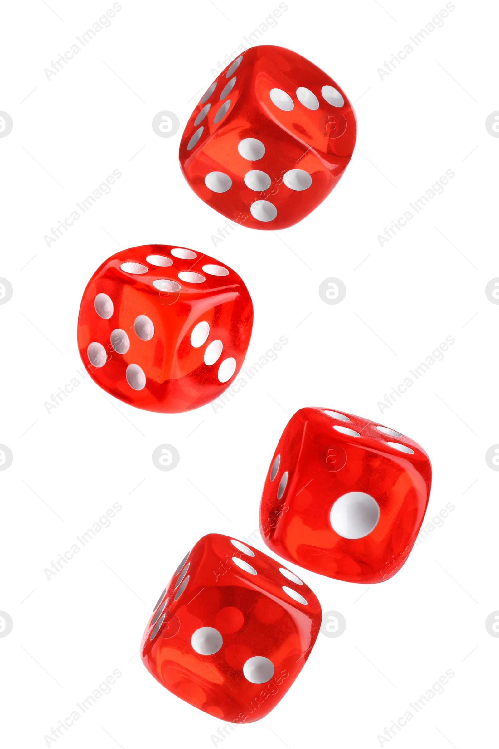 Image of Four red dice in air on white background