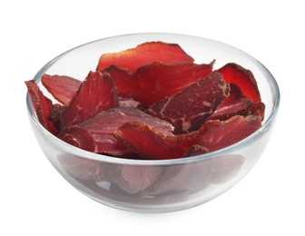 Photo of Glass bowl of delicious beef jerky isolated on white