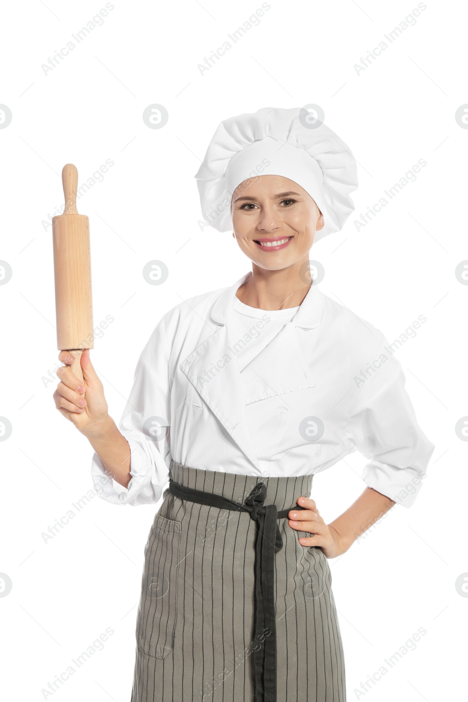 Photo of Female chef holding rolling pin on white background