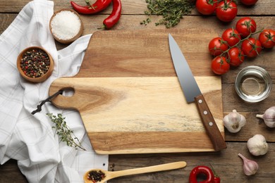 Photo of Flat lay composition with cutting board and ingredients on wooden table. Cooking utensils