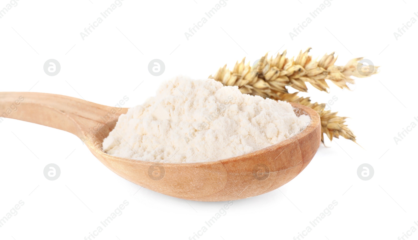 Photo of Wooden spoon of wheat flour isolated on white