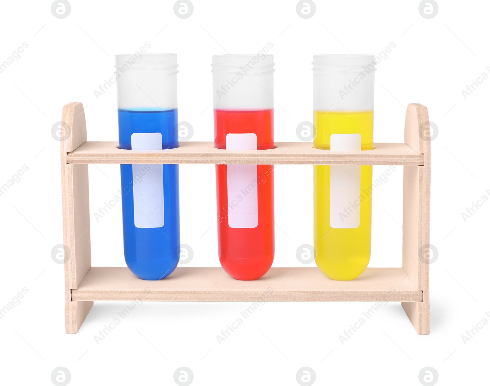 Photo of Test tubes with colorful liquids in wooden stand isolated on white. Kids chemical experiment set