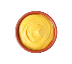 Bowl with delicious mustard on white background, top view