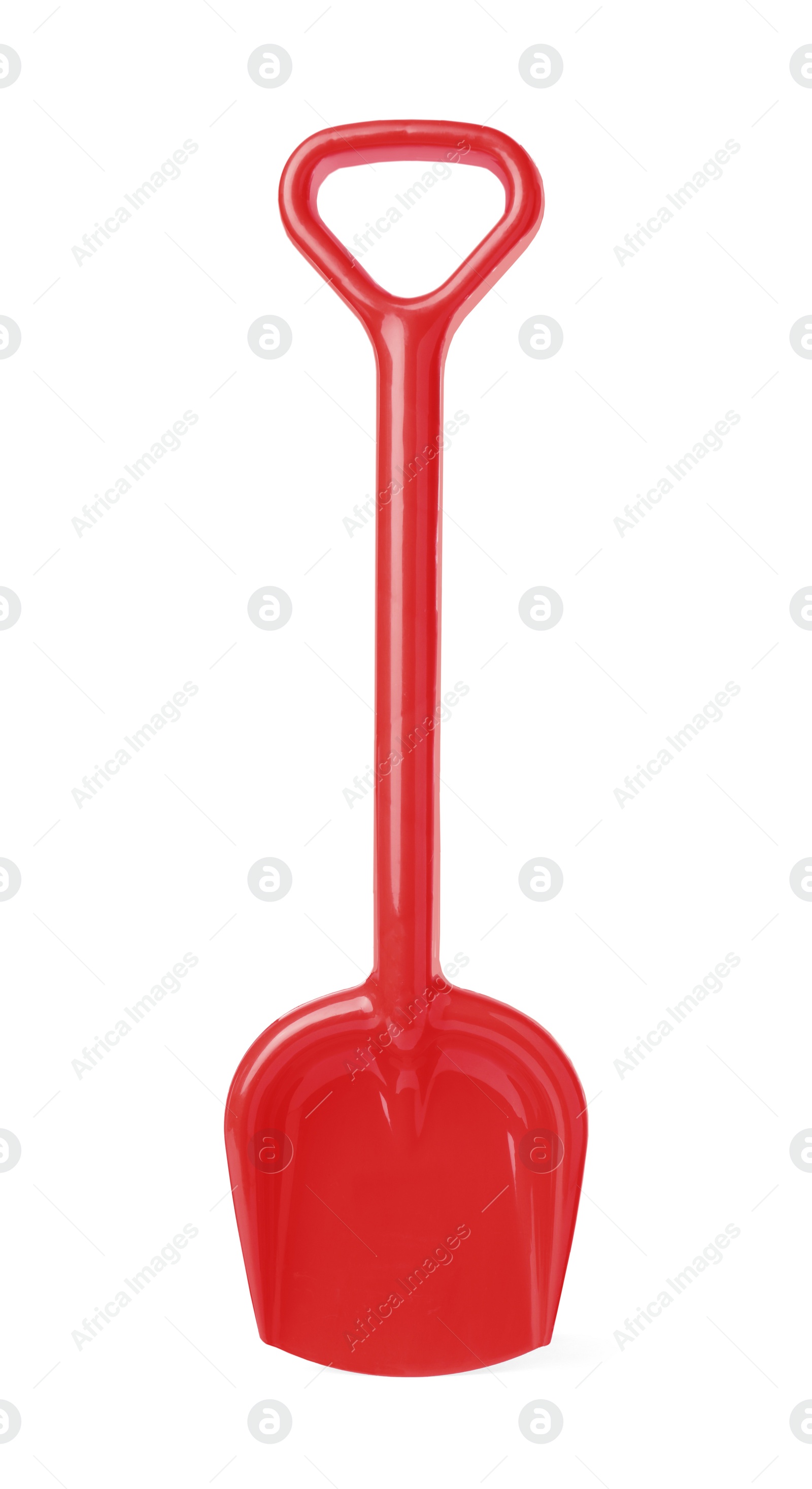 Photo of Red plastic toy shovel isolated on white