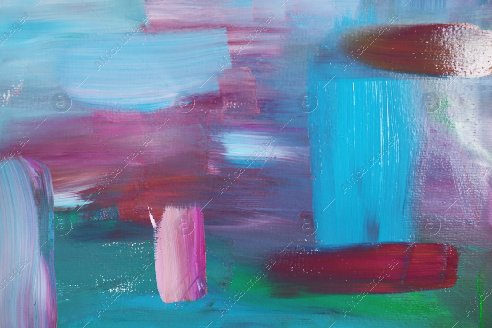 Photo of Canvas with colorful abstract painting, closeup view