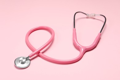 One stethoscope on pink background. Medical tool