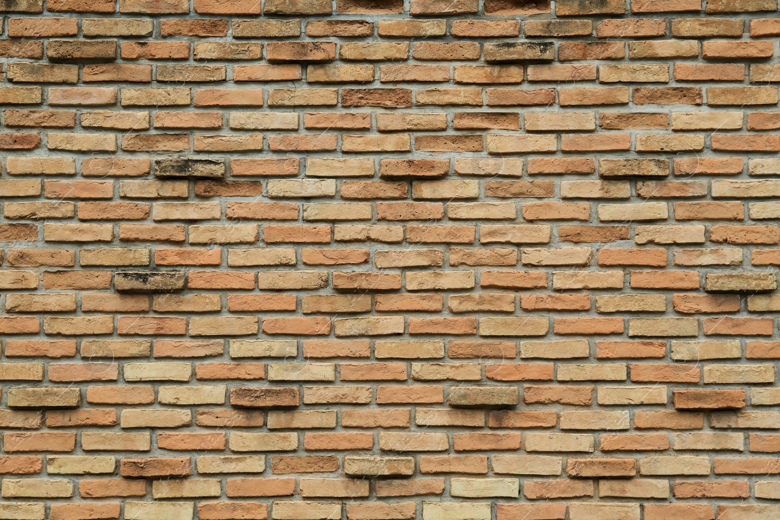 Photo of Texture of red brick wall as background, closeup