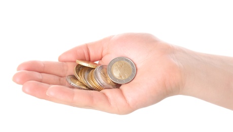 Photo of Woman holding coins in hand on white background, closeup