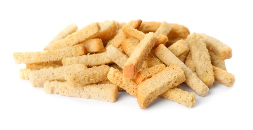 Photo of Heap of crispy rusks with seasoning on white background