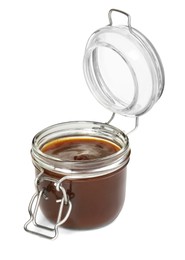 Photo of Tasty barbecue sauce in glass jar isolated on white