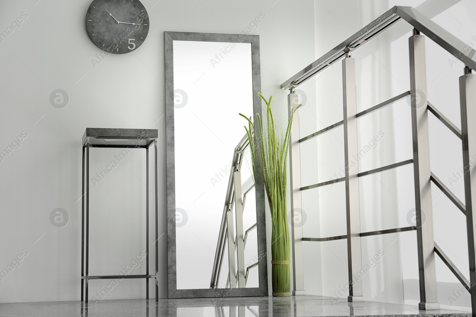 Photo of Elegant room interior with large mirror