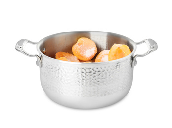 Photo of Pot with apricots and sugar on white background. Making delicious jam