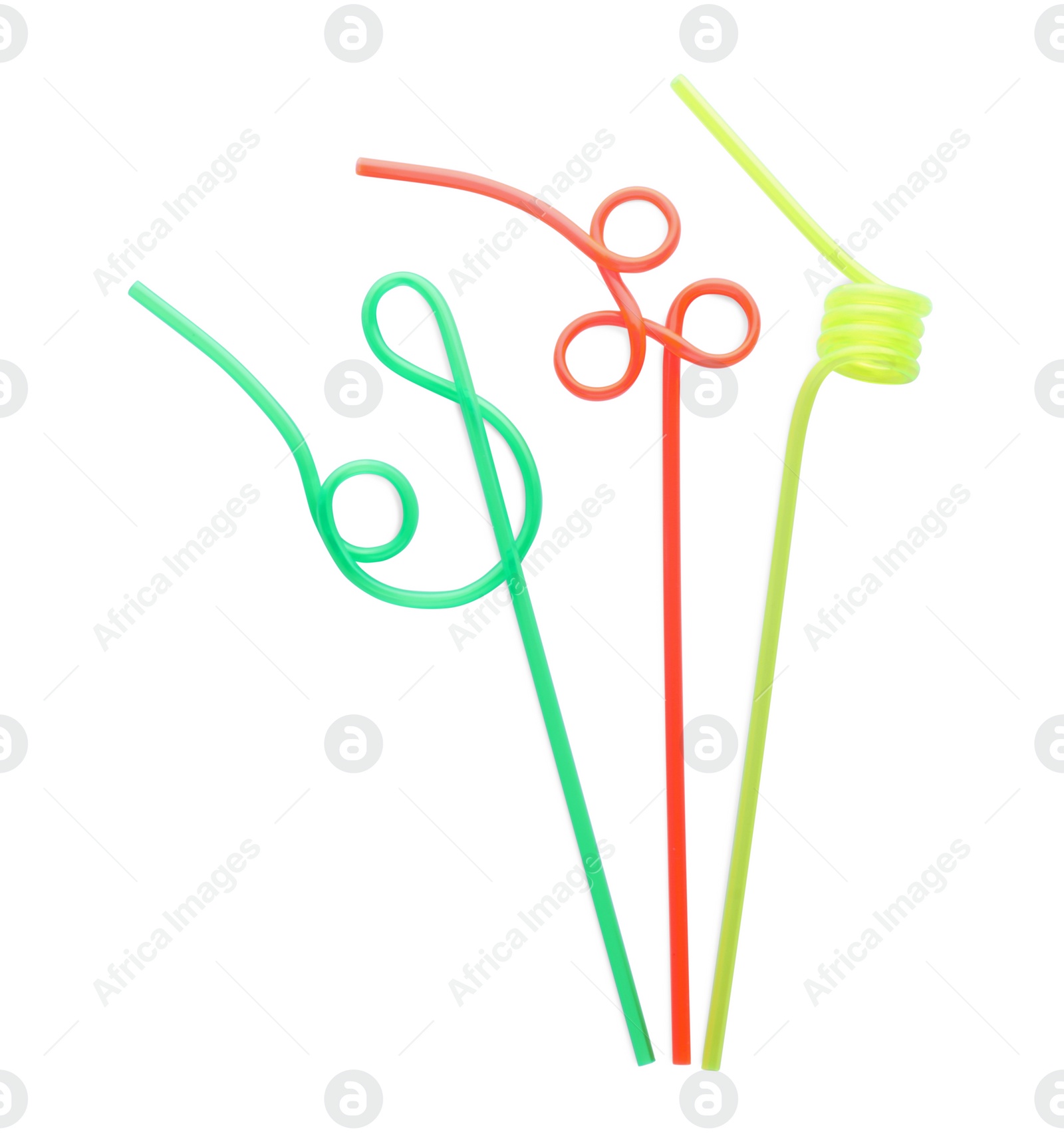 Photo of Color plastic cocktail tubes on white background, top view