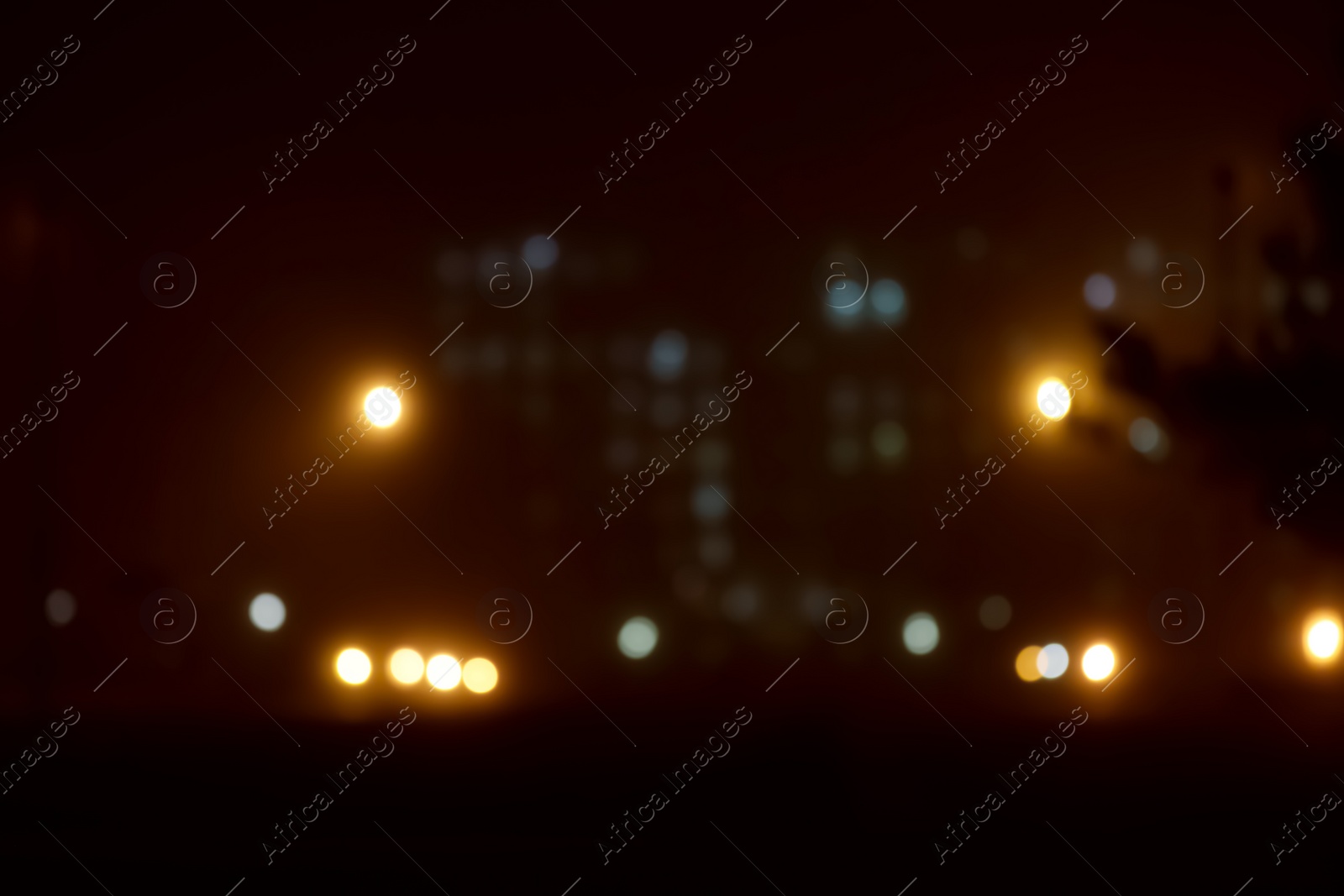 Photo of Blurred view of night city. Bokeh effect