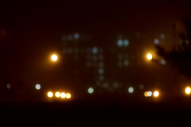 Photo of Blurred view of night city. Bokeh effect