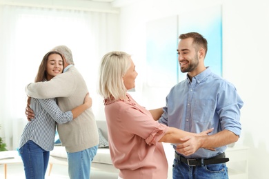 Photo of Happy family at home. Reunion of generations