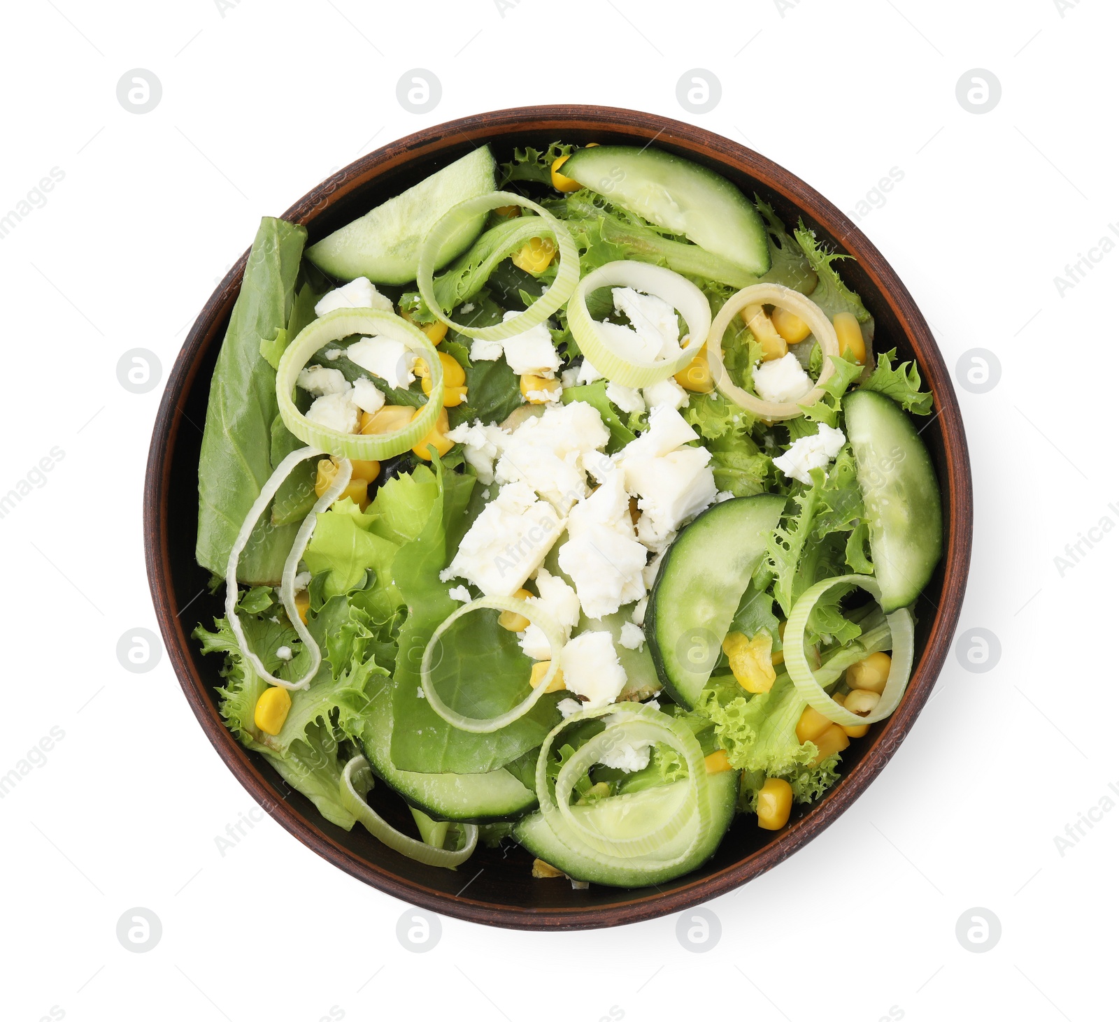 Photo of Bowl of tasty salad with leek and cheese isolated on white, top view