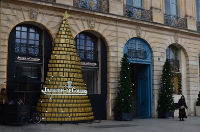 Photo of Paris, France - December 10, 2022: Jaeger-LeCoultre store exterior with Christmas decor