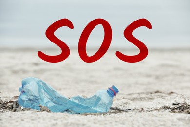 Image of Word SOS and used plastic bottle on beach. Recycling problem