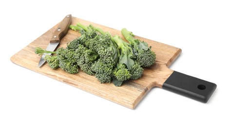 Photo of Wooden board with fresh raw broccolini and knife isolated on white. Healthy food