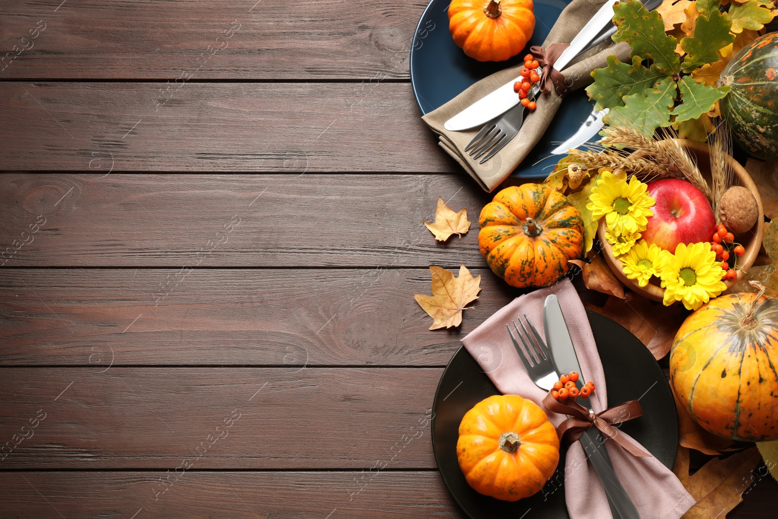 Photo of Festive table setting on wooden background, flat lay with space for text. Thanksgiving Day celebration