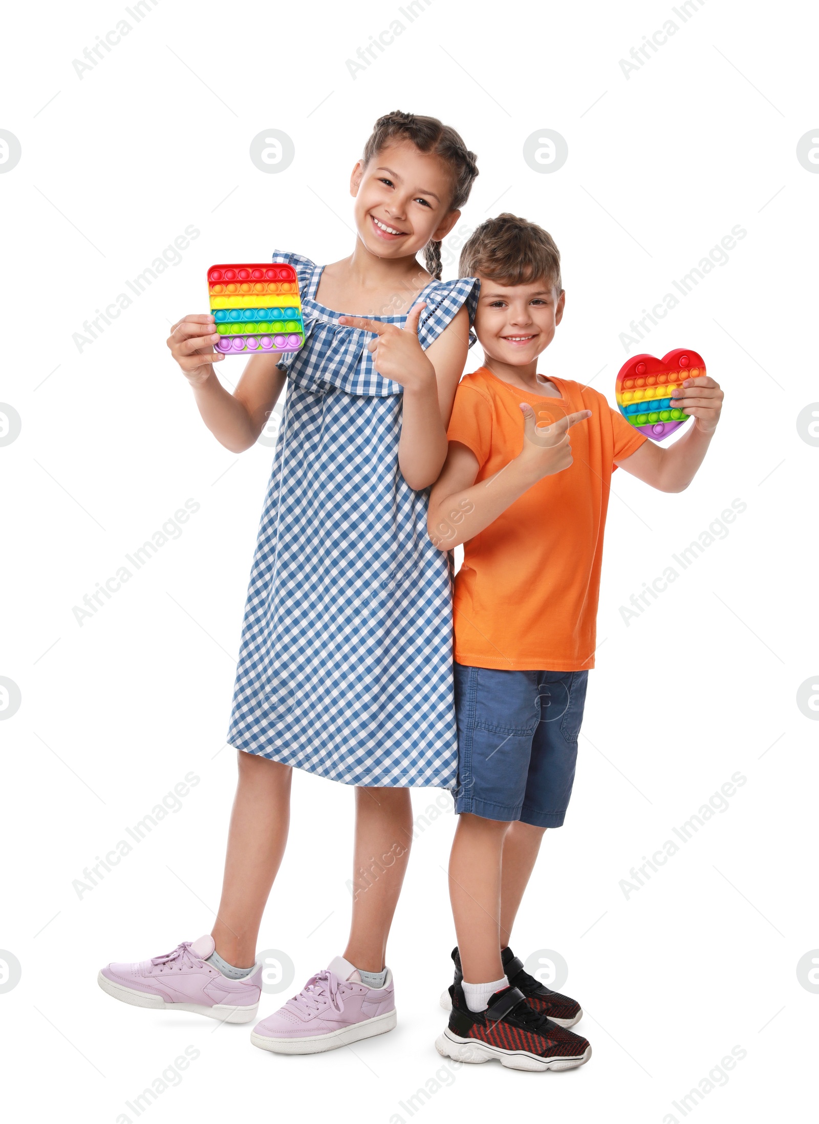 Photo of Children with pop it fidget toys on white background