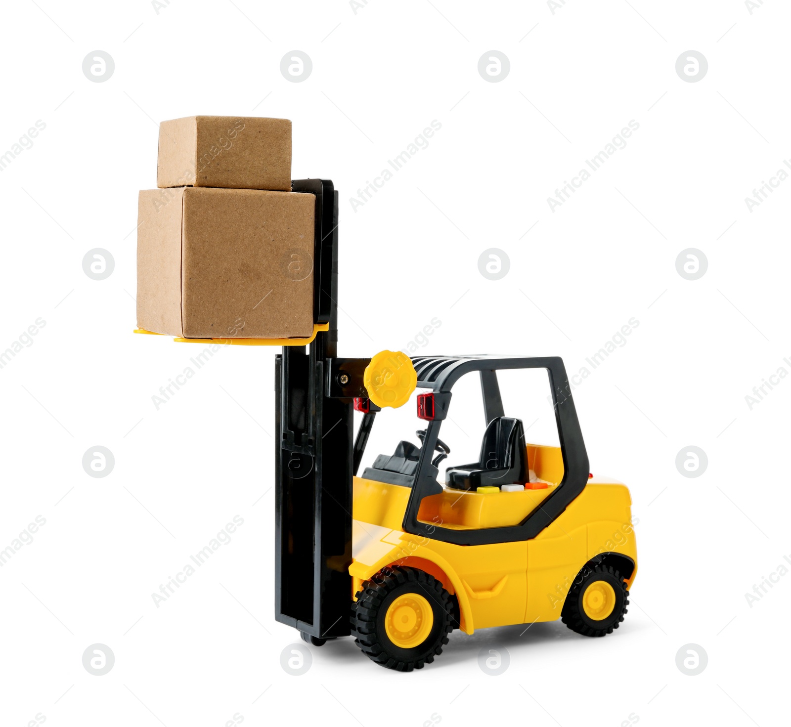 Photo of Toy forklift with boxes isolated on white. Logistics and wholesale concept