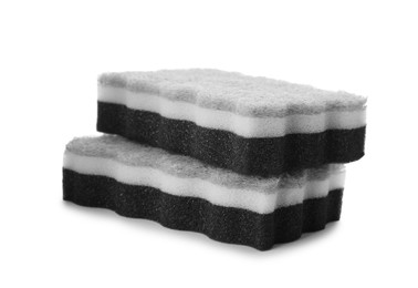 Photo of Layered cleaning sponges with abrasive scourers on white background
