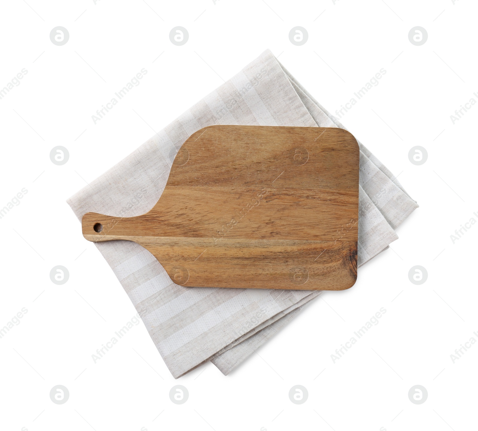 Photo of Wooden cutting board and kitchen towel isolated on white, top view