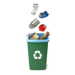 Image of Garbage falling into trash bin on white background