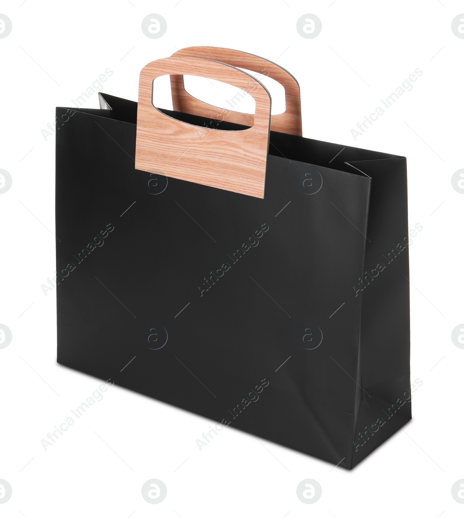 Photo of One black paper bag isolated on white