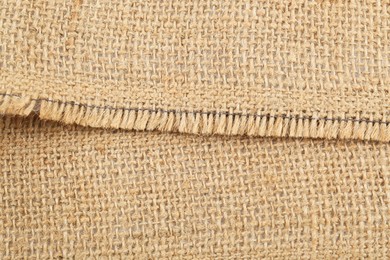 Texture of burlap fabric as background, closeup