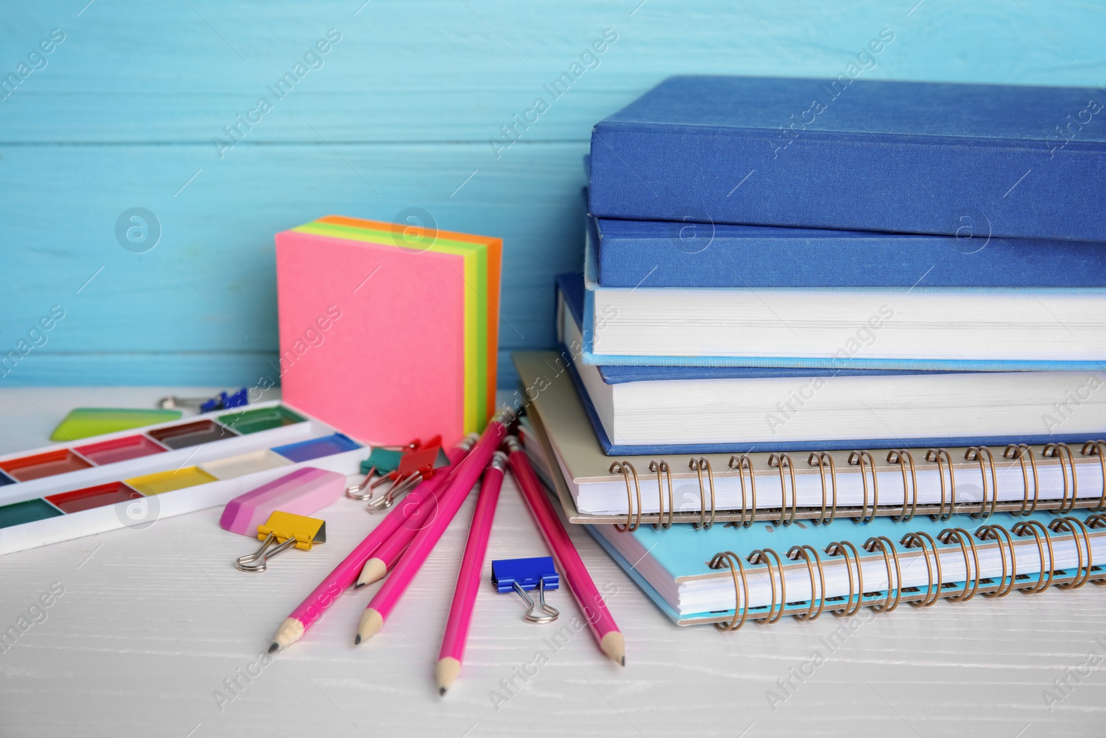 Photo of Different stationery on wooden table. Back to school