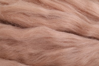 Photo of Soft felting wool as background, closeup view