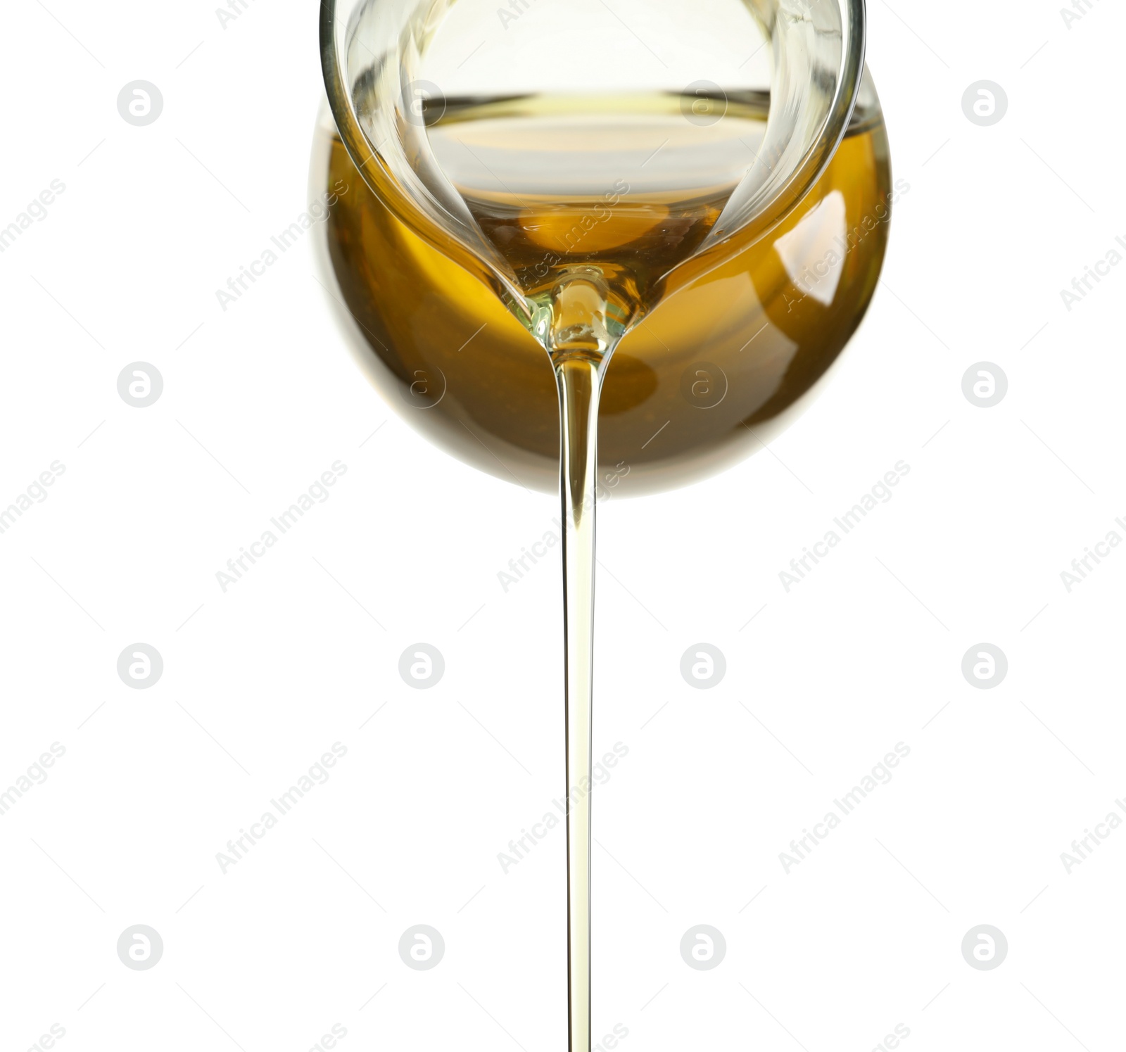 Photo of Pouring fresh olive oil on white background