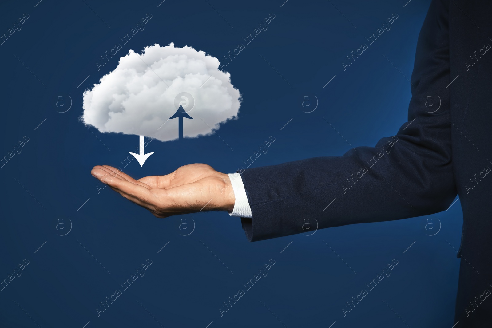 Image of Modern storage technology concept. Man holding cloud on blue background, closeup